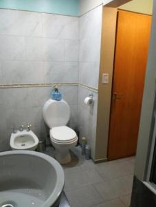 Ett badrum på Alem Casa de Familia