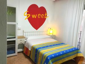 Cama o camas de una habitación en Sweet Home Salamanca