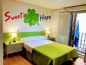 Cama o camas de una habitación en Sweet Home Salamanca
