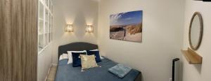 Posteľ alebo postele v izbe v ubytovaní Baltica Sea Apartment