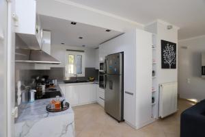 Kuchyň nebo kuchyňský kout v ubytování Villa Theo Corfu
