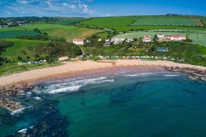 an aerial view of a beach and the ocean at Argyle House - Stunning 2 Bed Cottage In Eyemouth in Eyemouth