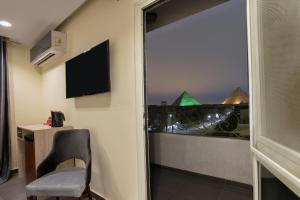 TV a/nebo společenská místnost v ubytování Brothers Pyramids View