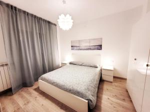 Posteľ alebo postele v izbe v ubytovaní A due passi dal mare - Appartamento per vacanze (cod. CITRA 008059-LT-0372)
