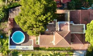 an overhead view of a house with a swimming pool at Villa Eliza in Denia