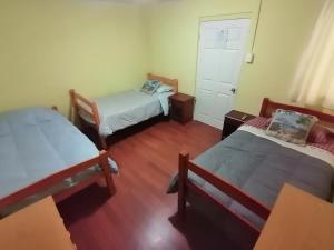 Cama o camas de una habitación en Hostal 2978