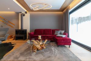 Część wypoczynkowa w obiekcie Luksusowy Apartament Enklawa pod Skrzycznem z sauną i bilardem - Dream Apart