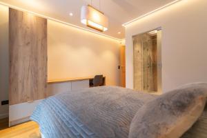 Łóżko lub łóżka w pokoju w obiekcie Luksusowy Apartament Enklawa pod Skrzycznem z sauną i bilardem - Dream Apart