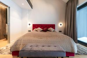 Łóżko lub łóżka w pokoju w obiekcie Luksusowy Apartament Enklawa pod Skrzycznem z sauną i bilardem - Dream Apart