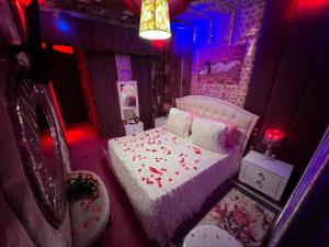 Posteľ alebo postele v izbe v ubytovaní Priamos Hotel Erato