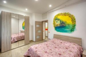 En eller flere senge i et værelse på Casa Vacanze La Via delle Stelle