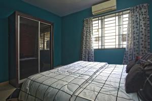 Llit o llits en una habitació de Teratak As-Sakinah