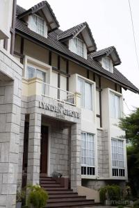a building with a sign on the front of it at The Lynden Grove in Nuwara Eliya