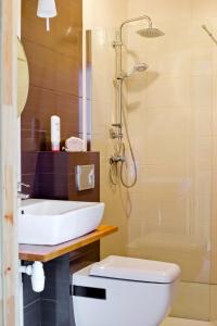 Koupelna v ubytování Balia Spa & Wellness