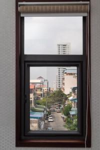 Nespecifikovaný výhled na destinaci Phnompenh nebo výhled na město při pohledu z hotelu