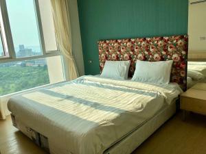 Postel nebo postele na pokoji v ubytování Grande Carribean condo sea view&park view Comfortable 1 bedroom apartment for 3 person with washing machine , kitchen and all utensils for the cooking