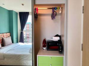Postel nebo postele na pokoji v ubytování Grande Carribean condo sea view&park view Comfortable 1 bedroom apartment for 3 person with washing machine , kitchen and all utensils for the cooking + 22 fotografií