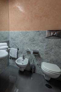 Koupelna v ubytování Hotel Petra