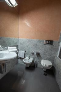 Koupelna v ubytování Hotel Petra