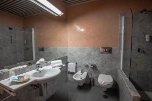 Koupelna v ubytování Hotel Petra