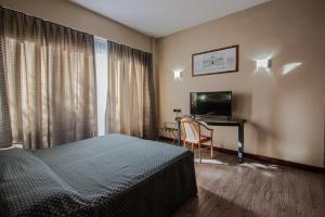 TV a/nebo společenská místnost v ubytování Hotel Petra
