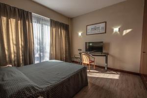 TV a/nebo společenská místnost v ubytování Hotel Petra