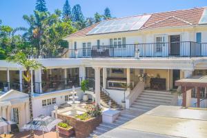 an aerial view of a house with a solarium at Emakhosini Boutique Hotel in Durban