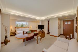 Uma TV ou centro de entretenimento em Blue Tree Towers Caxias do Sul