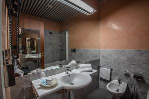 Koupelna v ubytování Hotel Petra