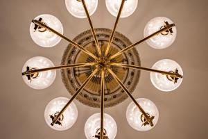 a chandelier with many clear glass spheres at First Hotel Christian IV in Kristianstad