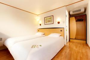 Katil atau katil-katil dalam bilik di Campanile Bordeaux Ouest - Le Bouscat