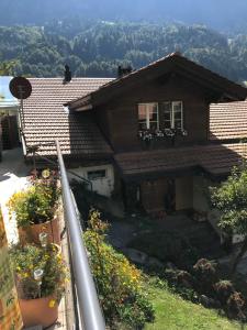 a house with a view of a mountain at Ferienwohnung Stalden in Lütschental