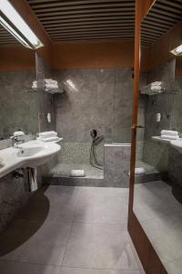 Koupelna v ubytování Hotel Petra