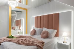 Łóżko lub łóżka w pokoju w obiekcie Hotel Nowodwory
