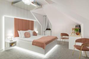 Łóżko lub łóżka w pokoju w obiekcie Hotel Nowodwory