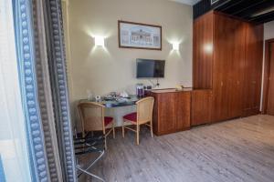 TV a/nebo společenská místnost v ubytování Hotel Petra