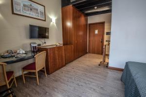 Kuchyň nebo kuchyňský kout v ubytování Hotel Petra