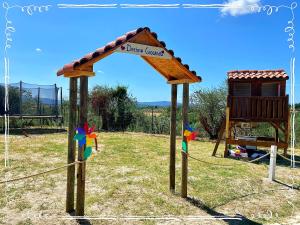 a playground with a sign that says dream forest at Tenuta Decimo - Villa Dini in San Gimignano
