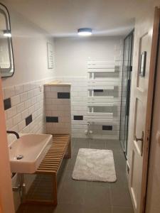Ванна кімната в Sport- und Seminarhaus Walsertal
