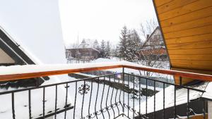 Apartamenty Sun & Snow Poronin v zime