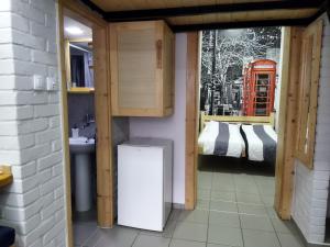 Voodi või voodid majutusasutuse Apartmani Sirmium toas