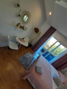 an overhead view of a living room with a table and chairs at Barko apartment and rooms in Hvar