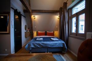 Кровать или кровати в номере Luxury Suites Meir