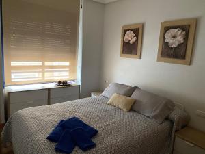 Posteľ alebo postele v izbe v ubytovaní TORREVIEJA + 8 fotografií