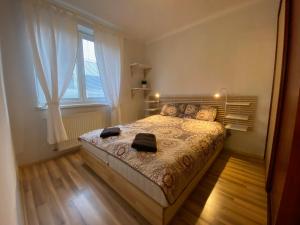 Postel nebo postele na pokoji v ubytování Apartmán Pošta + 16 fotografií