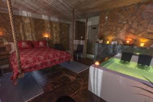 Postel nebo postele na pokoji v ubytování Onore dell amore 2 apartman sa djakuzijem