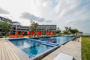 Bazén v ubytování Hotel Sonar Bangla Taki nebo v jeho okolí