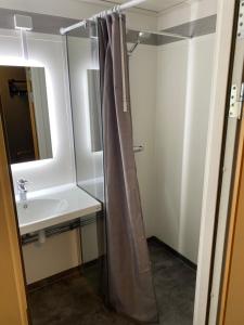Koupelna v ubytování Hotell Smedjan