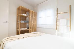 Posteľ alebo postele v izbe v ubytovaní Patio Budget Studio 11