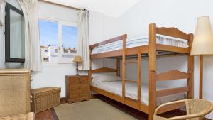 A bed or beds in a room at 1Sarri - Llafranc